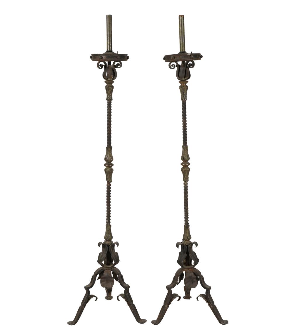 Appraisal: PAIR OF SPANISH REVIVAL IRON TORCHIERESwith floral design tripod base