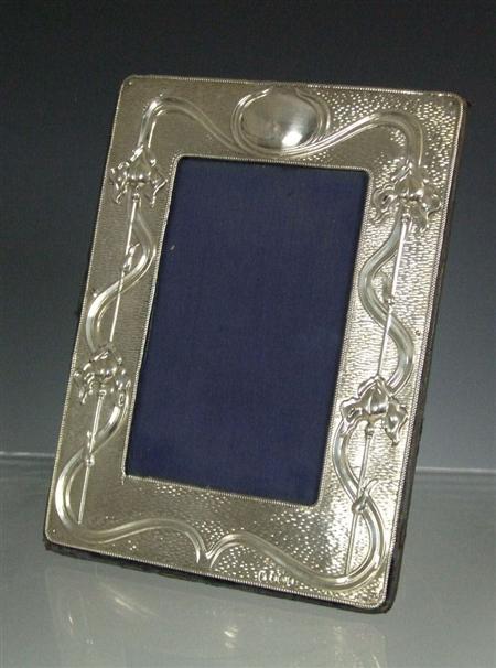 Appraisal: ART NOUVEAU PHOTOGRAPH FRAME DATED silver of rectangular outline embossed