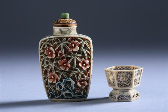 Appraisal: CHINESE IVORY RETICULATED SNUFF BOTTLE AND HEXAGONAL BASKET Of flattened