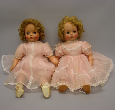 Appraisal: Pair of vinyl oilcloth baby dolls Both are dressed in