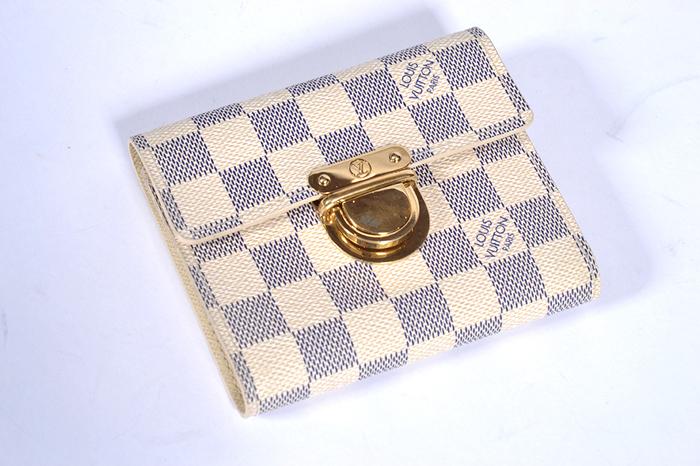 Appraisal: A PORTEFEUILLE JOEY BY LOUIS VUITTON WALLET