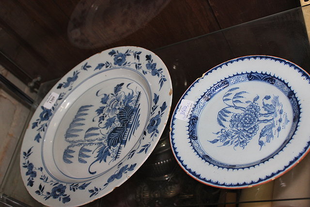 Appraisal: A LATE TH CENTURY ENGLISH DELFTWARE CHARGER decorated with floral