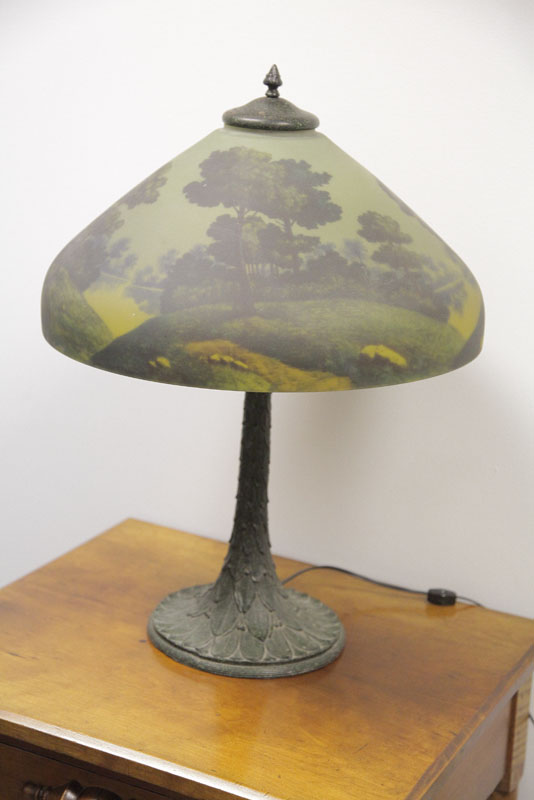 Appraisal: TABLE LAMP WITH REVERSE PAINTED SHADE Shade depicting a bucolic