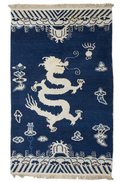 Appraisal: Chinese Dragon Rug ca having a large white and beige