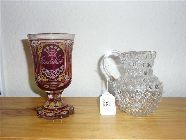 Appraisal: A BOHEMIAN RUBY FLASHED GOBLET with floral and gilt decoration