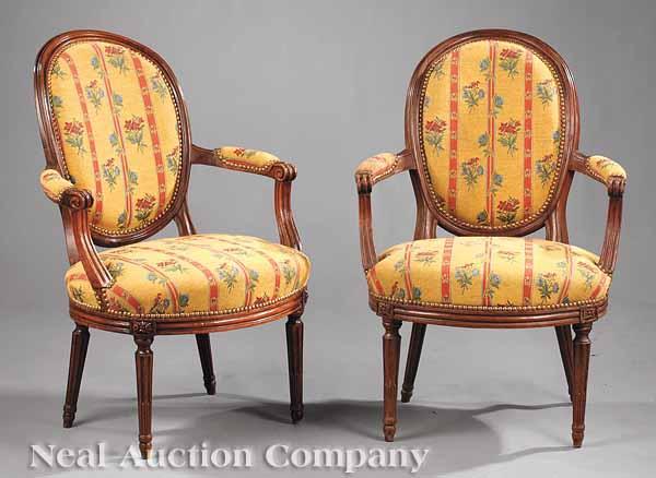 Appraisal: A Pair of Louis XVI Carved Fruitwood Fauteuils late th