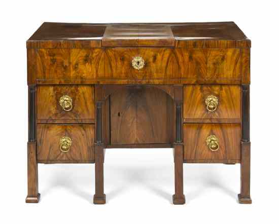 Appraisal: A Biedermeier Kneehole Dressing Table the rectangular top centered with