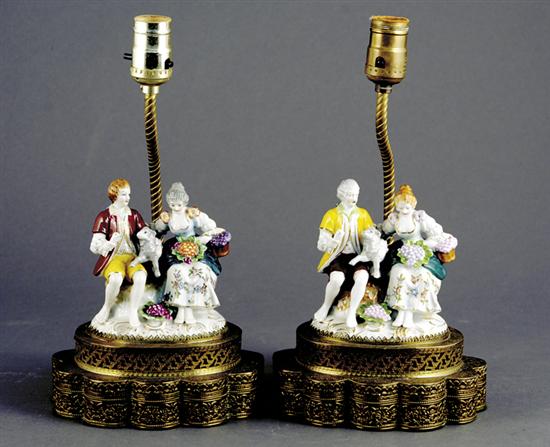 Appraisal: Pair Continental porcelain figural lamps romantic figures in seated pose