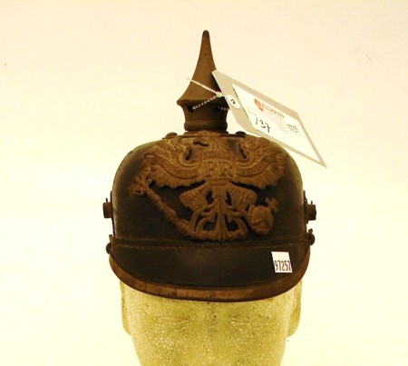 Appraisal: Imperial German leather bodied spiked helmet for enlisted ranks Helmet