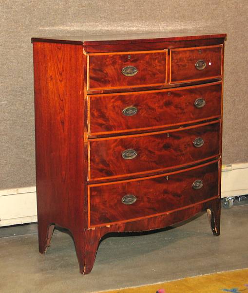 Appraisal: An George III inlaid mahogany bowfront chest of drawers last