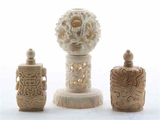 Appraisal: Two Carved Ivory Snuff Bottles together with a carved ivory