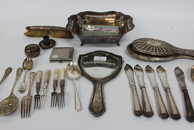 Appraisal: A SILVER BACKED HAND MIRROR together with a further silver