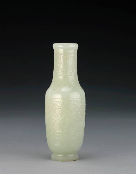 Appraisal: A pale greenish-white nephrite vase th Century Of simple baluster