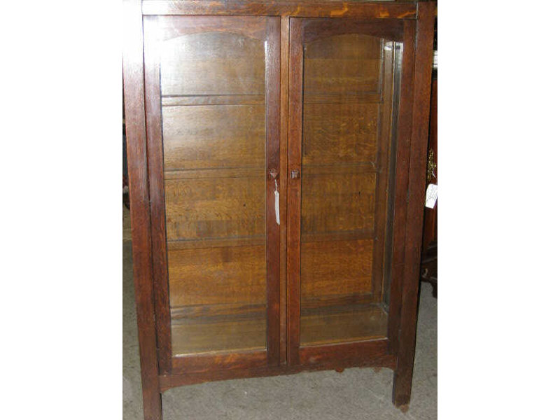 Appraisal: AMERICAN OAK ARTS CRAFTS CHINA CABINET having a pair of