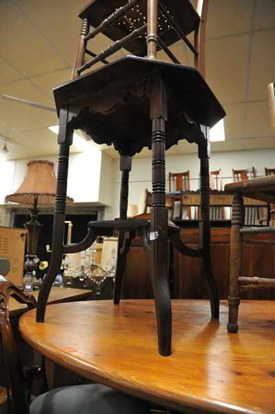 Appraisal: AN EDWARDIAN OCTAGONAL BLACKWOOD TWO TIER OCCASIONAL TABLE