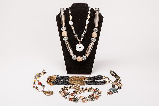 Appraisal: A collection of six various bead necklaces including a black