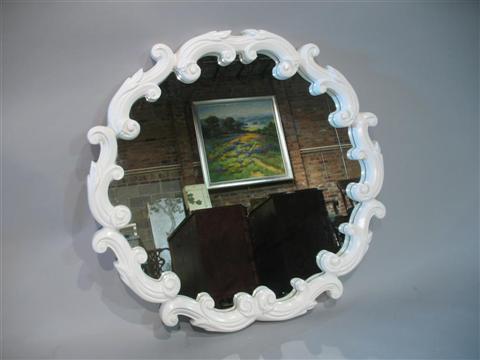 Appraisal: DOROTHY DRAPER CARVED WHITE PAINTED MIRROR With an s-scroll carved