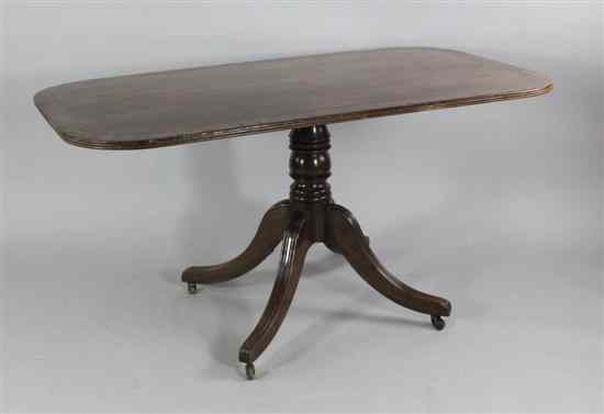 Appraisal: A Regency rosewood crossbanded mahogany breakfast table with turned column