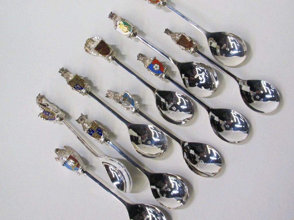 Appraisal: Set of ten silver spoons with finials depicting assorted family