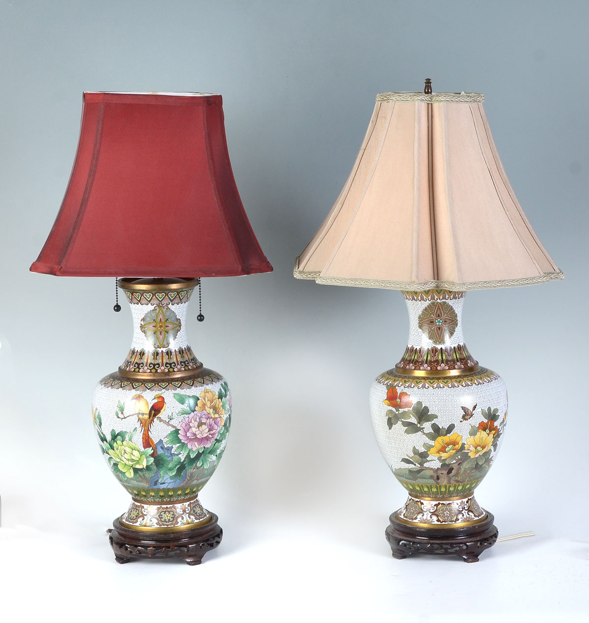 Appraisal: PAIR OF WHITE GROUND CLOISONNE LAMPS - double light Chinese