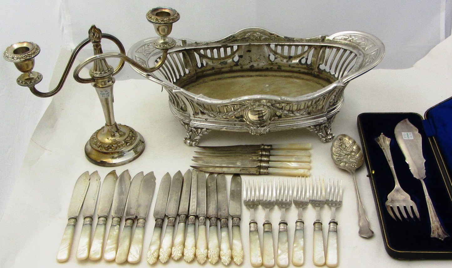 Appraisal: Plated wares comprising an oval centre piece basket raised on