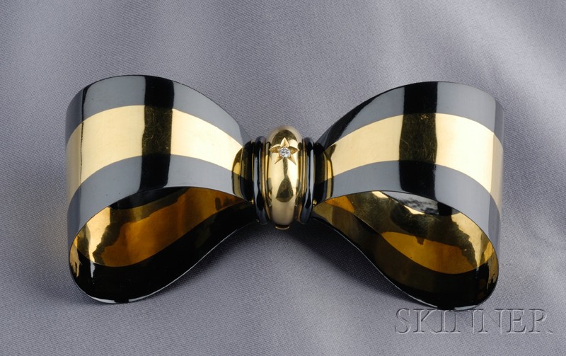 Appraisal: kt Gold and Stainless Steel Bow Pendant Brooch with diamond