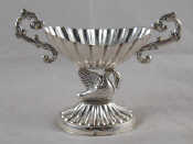 Appraisal: A Spanish standard silver two handled ribbed oval bowl supported