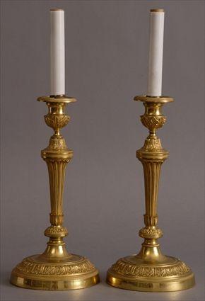 Appraisal: PAIR OF LOUIS XVI-STYLE GILT-METAL CANDLESTICKS MOUNTED AS LAMPS Each