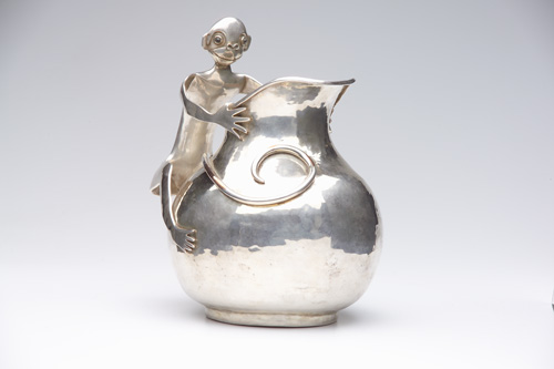 Appraisal: LOS CASTILLOS Unusual and whimsical hammered silver-plated water pitcher with