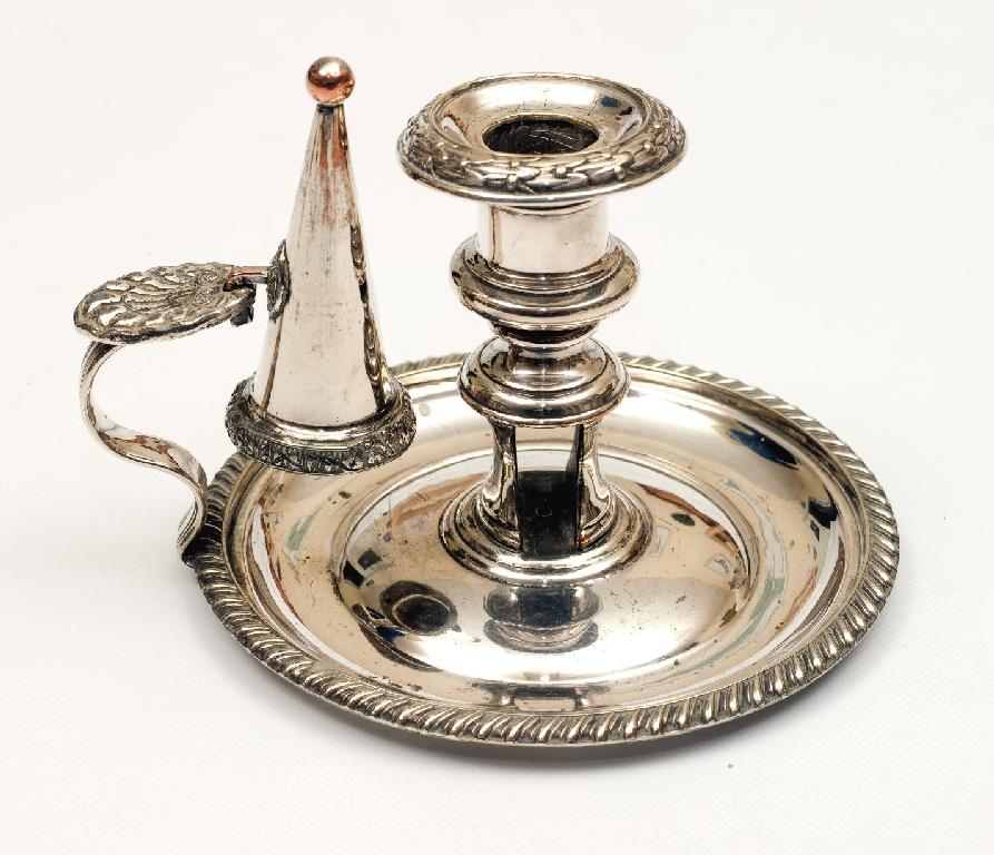 Appraisal: th CENTURY SHEFFIELD-PLATED CHAMBERSTICK the circular drip pan with gadrooned