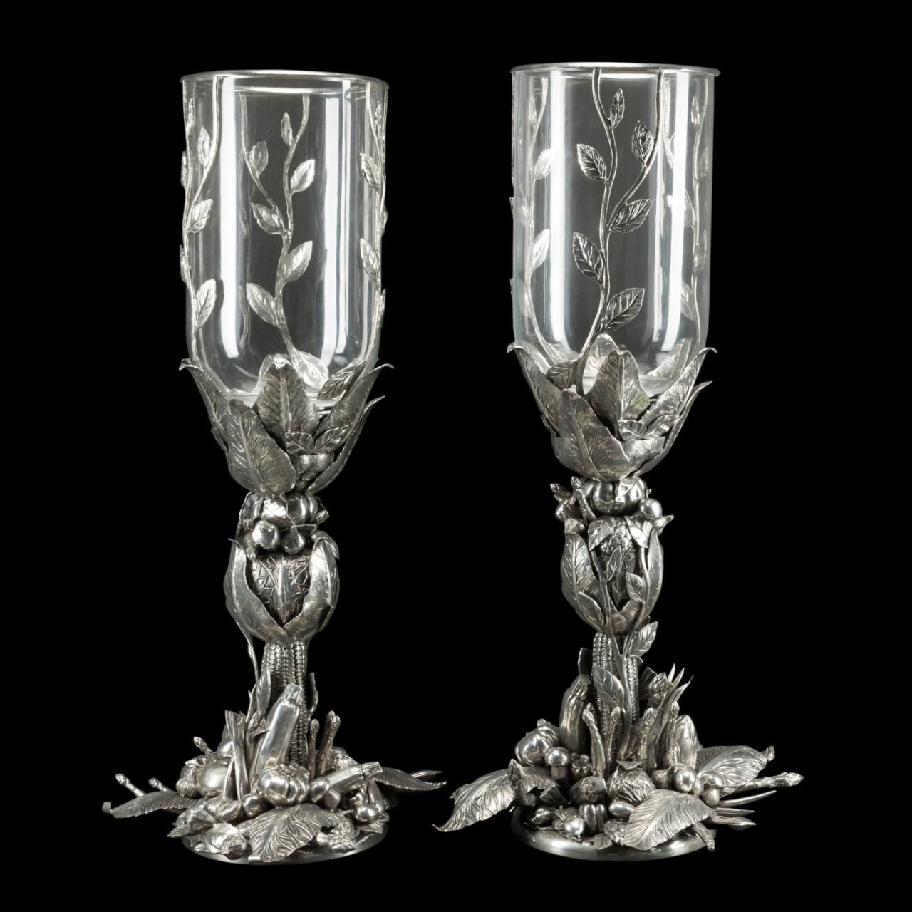 Appraisal: PAIR CIPOLLA FIGURAL PEWTER HURRICANES Pair of Italian figural pewter