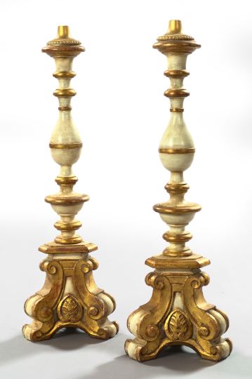 Appraisal: Imposing Pair of Italian White-Painted and Giltwood Altar Sticks first