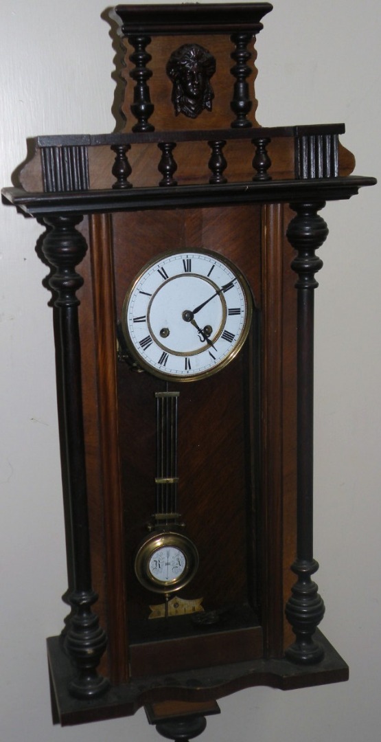 Appraisal: An early thC walnut and mahogany stained Vienna wall clock