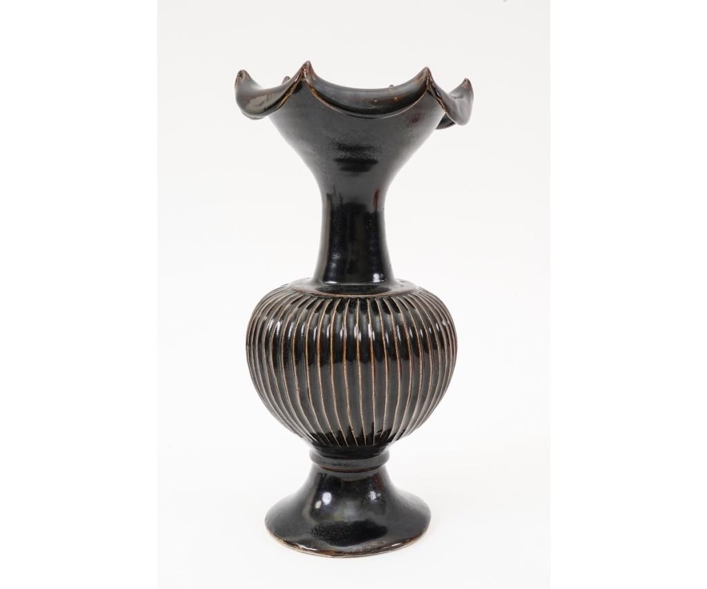 Appraisal: Chinese tall brown glazed blackware vase with wide mouth flared