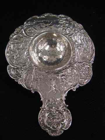 Appraisal: Dutch Sterling Silver Tea Strainer elaborate courting scenes circa ''