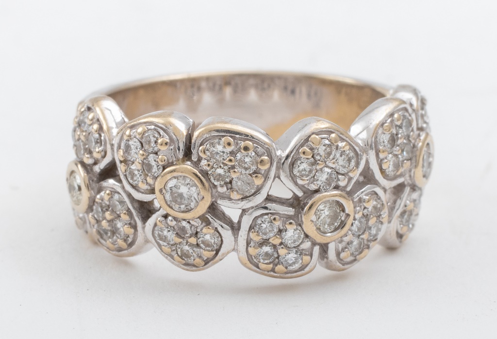 Appraisal: K WHITE GOLD DIAMOND FLORAL WIDE BAND RING k white