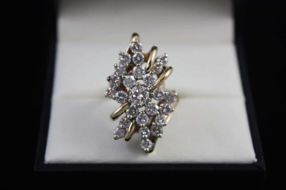 Appraisal: DIAMOND AND FOURTEEN KARAT GOLD WATERFALL-STYLE RING with appraisal The