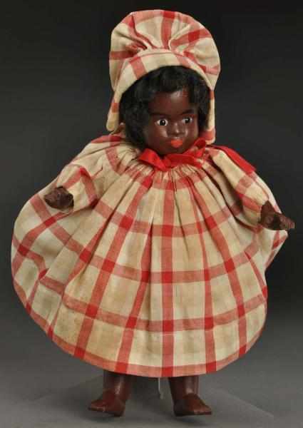 Appraisal: Rare Black All-Bisque Character Doll Gebruder Kuhnlenz doll with head