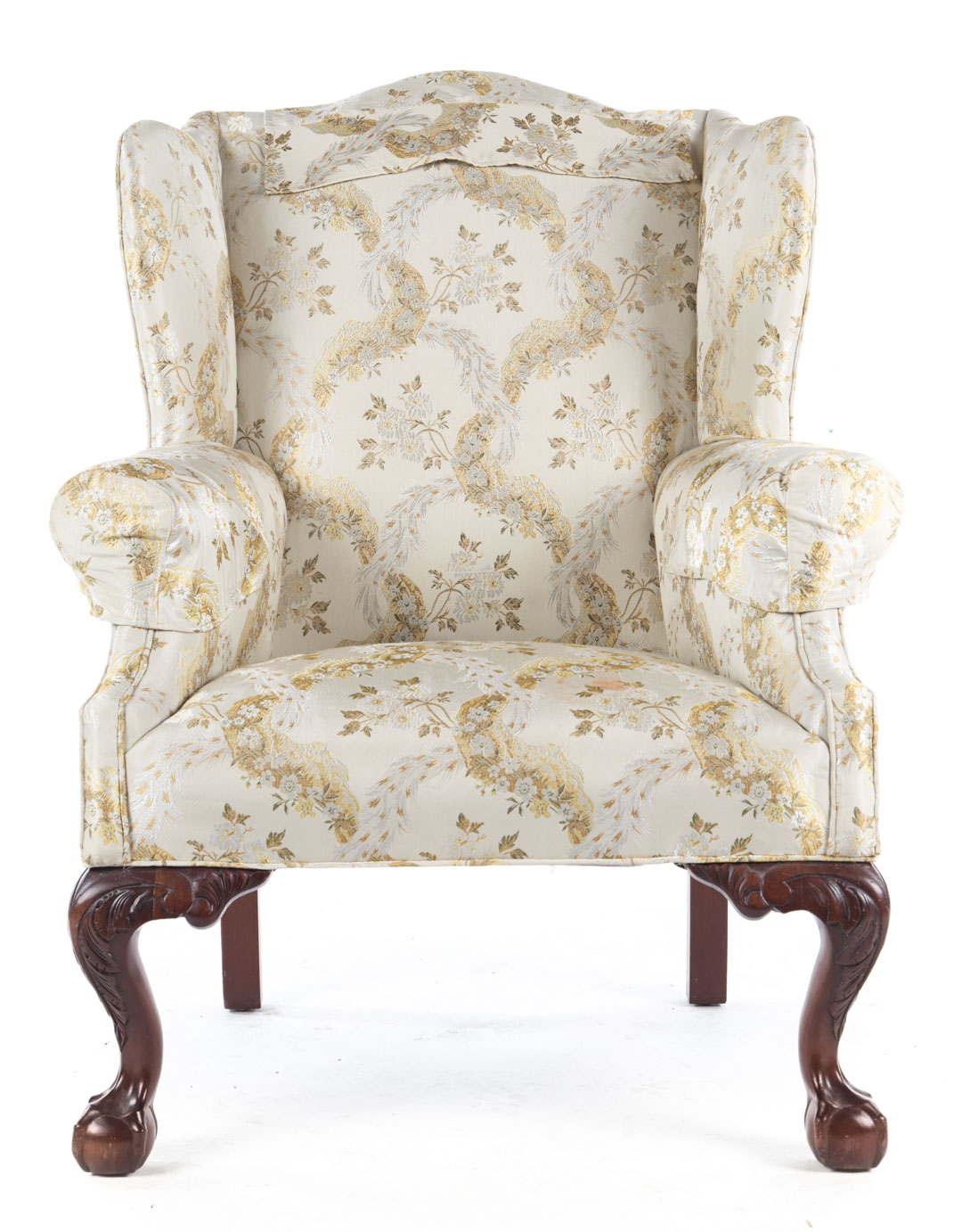 Appraisal: Chippendale style upholstered wing chair serpentine crest rail winged back