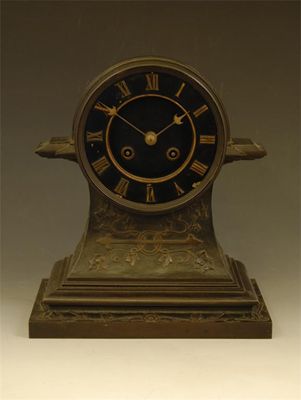 Appraisal: A late th century bronzed mantel clock with an eight