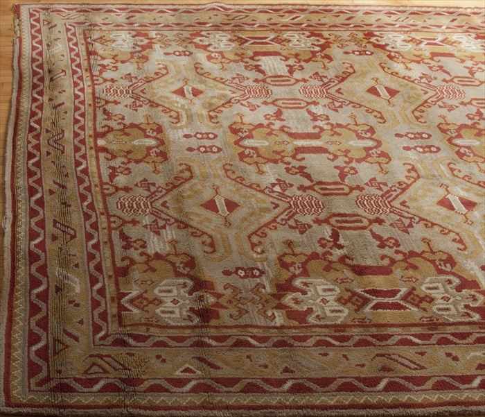 Appraisal: USHAK CARPET EARLY TH C Worked with rose and saffron