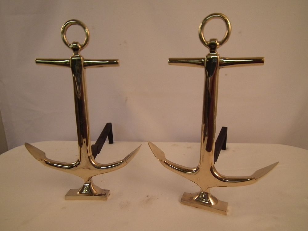 Appraisal: PAIR ANCHOR ANDIRONS Pair modern brass anchor-form andirons in tall