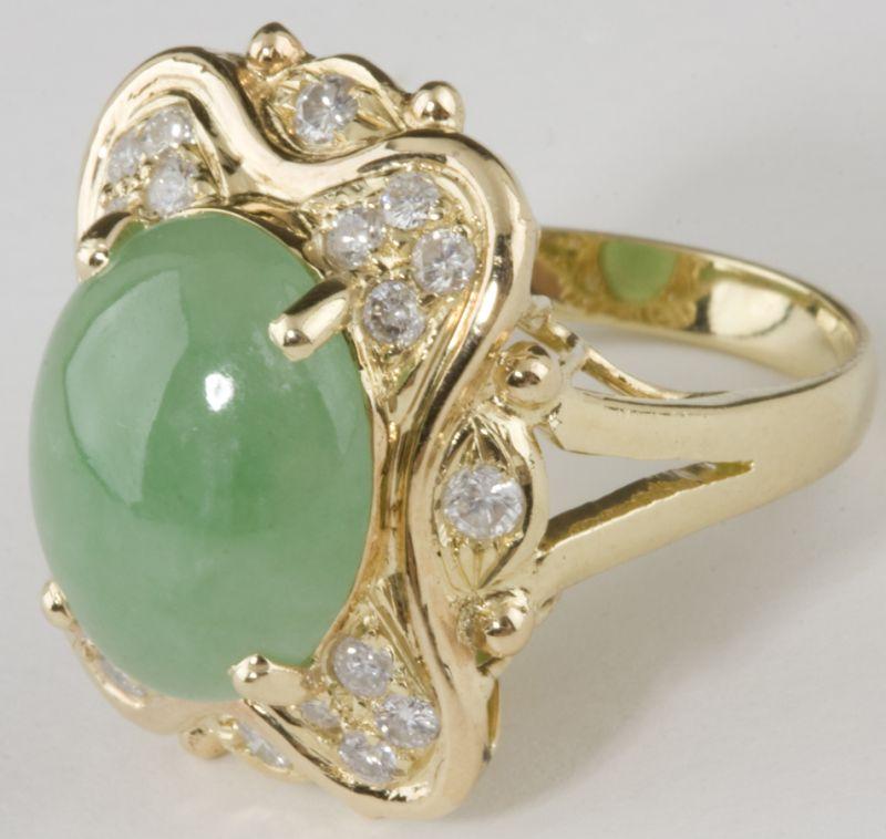 Appraisal: Jade and Diamond Cocktail Ring set in the center with