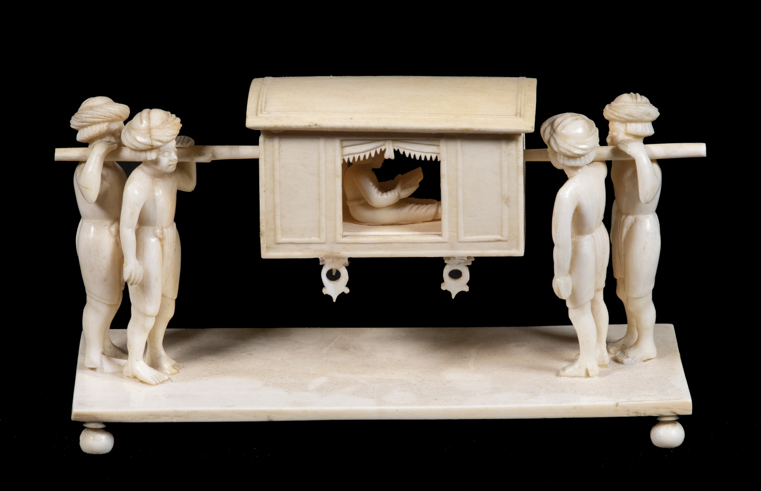 Appraisal: TH C COLONIAL INDIAN IVORY FIGURINE Palanquin with Four Bearers