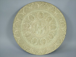 Appraisal: An early th century Indian bronze circular dish chased with