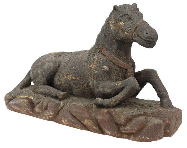 Appraisal: Large carved wood figure Recumbent Horse wearing bridle and pendant