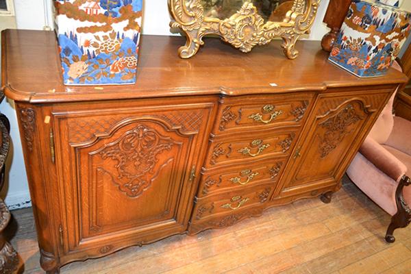 Appraisal: A FRENCH PROVINCIAL STYLE OAK TWO DOOR BUFFET