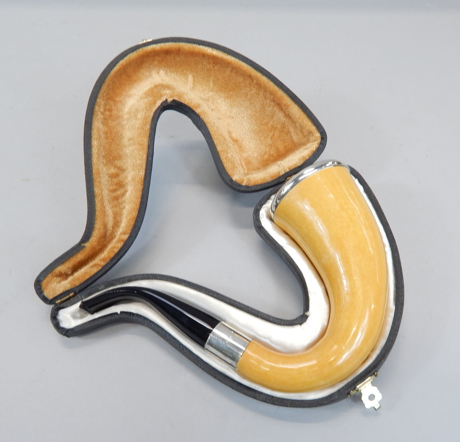 Appraisal: A modern Meerschaum pipe with white metal mounts stamped Sterling