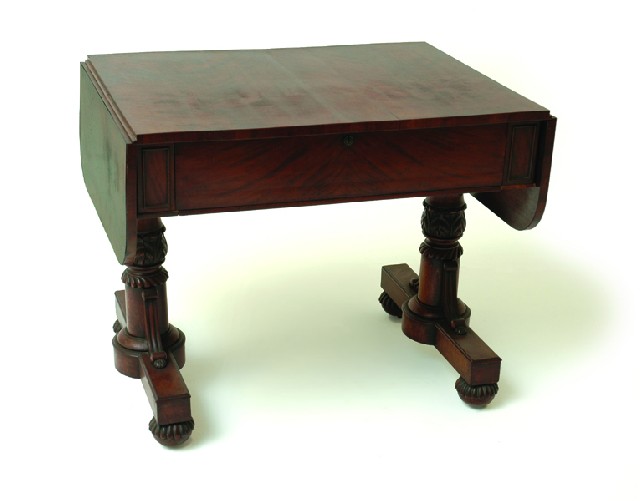 Appraisal: A WILLIAM IV FLAME MAHOGANY SOFA TABLE The rounded rectangular