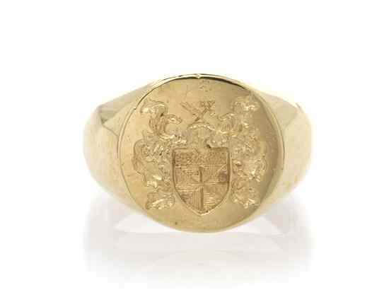 Appraisal: A Karat Yellow Gold Crest Ring centered around an intricately